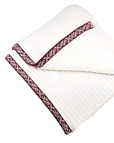 Wool Blanket | Sustainable |Nature | Cruelty-free outerwear | White and Red | Still life | Product shot