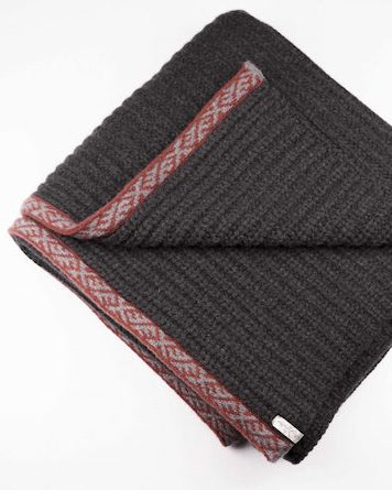 Wool Blanket | Sustainable |Nature | Cruelty-free outerwear | Black and Red | Still life | Product shot