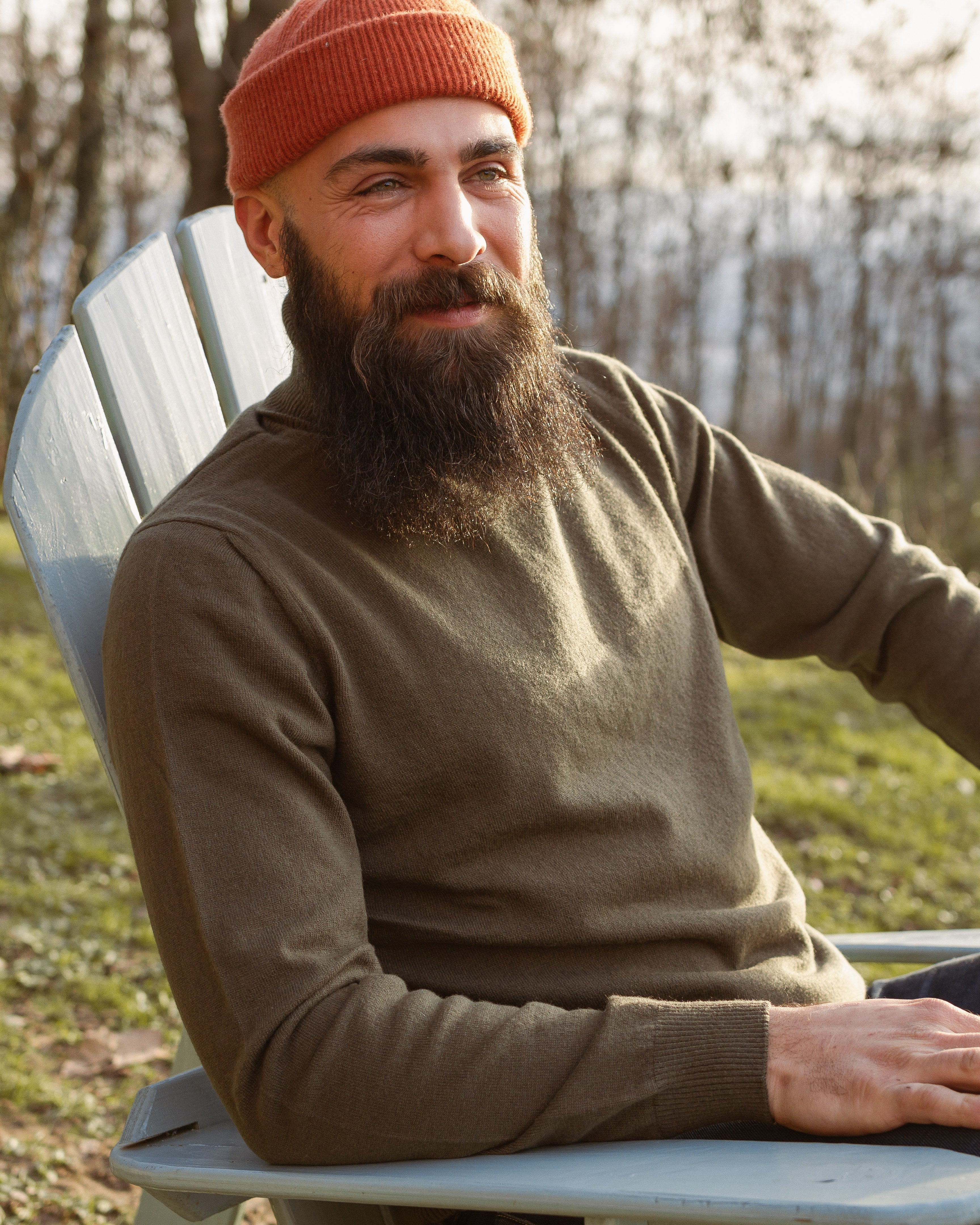 Merino Wool Sweater | Turtleneck | Sustainable | Nature | Emotional Shot | Green | Outdoor Shot | Smiling | Lifestyle