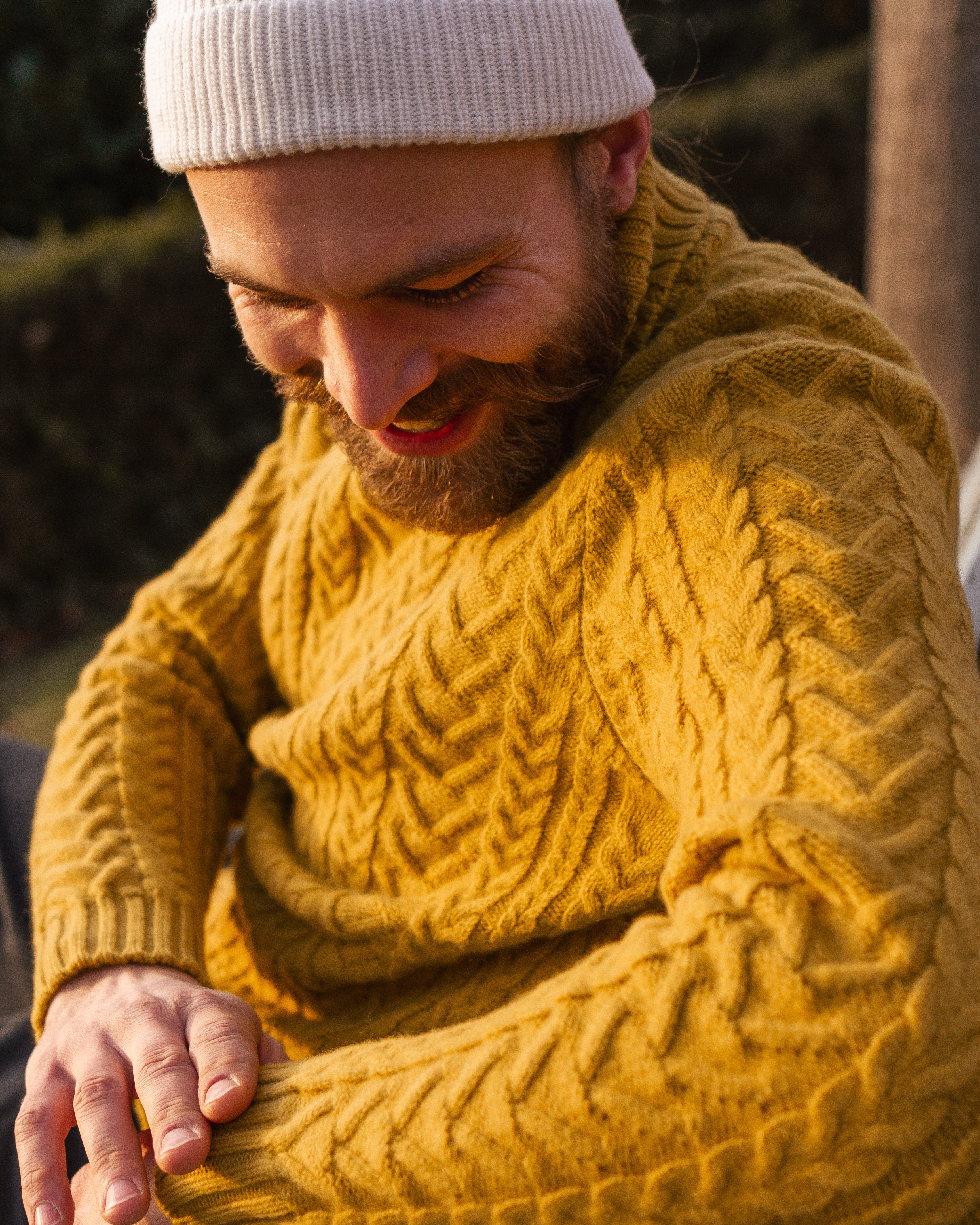 Merino Wool Sweater | Turtleneck | Fisherman Sweater | Yellow | Sustainable | Nature | Emotional Shot | Outdoor Shot | Smiling